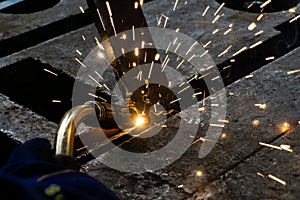 Welder at work in the workshop, electric and gas welding at work