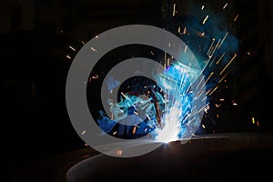 Welder worker is welding