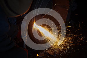 Welder worker is welding