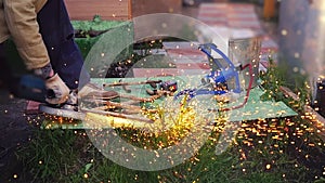 A welder working on the metals outdoor in slow motion. 1920x1080