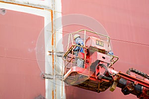 Welder working on a ship