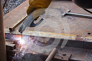 Welder working a welding metal