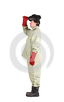 Welder in workwear suit with mask.
