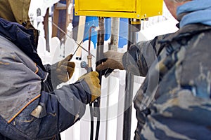 Welders busy with LPG pipeline