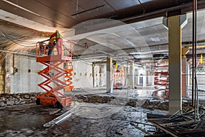 Welders on Scissor Lift at Construction site photo