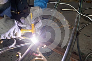 Welders are welding the various parts.