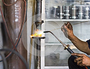 Welders were repairing Shock absorbers