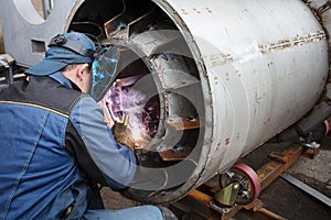 Welders working at the factory