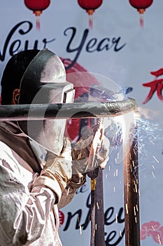 Welders are working in the New Year.