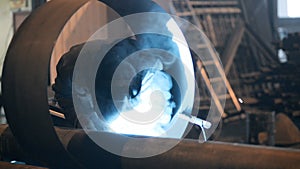 Welding Engineer weld for the creation of pipes.a