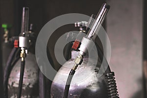 Welding equipment acetylene gas cylinder tank with gauge regulators manometers.