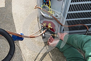 Welding, Install Central Air Conditioner AC Unit photo