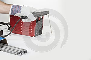 Welding inventer and electrodes on a white