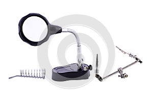 Welding magnifier with tools on white background