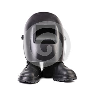 Welding mask and pair boots.
