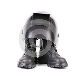 Welding mask and pair boots.