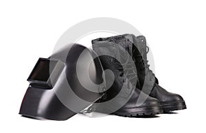Welding mask and working boots.