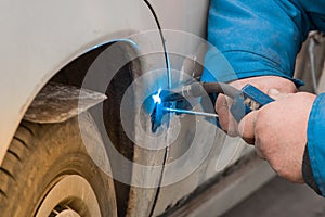 Welding and metal works repair of the car body