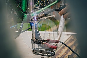 Welding an old crank on a bicycle