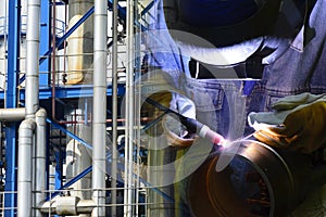 welding operator and industrial pipeline.