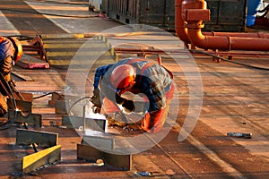 Welding plates on a tanker