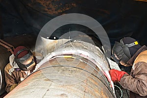 Welding with pre-and concomitant heating