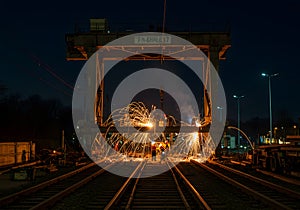 Welding railway tracks night