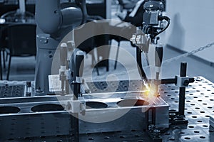 The welding robot machine for welding automotive part.