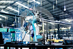 Welding robot in production plant or factory