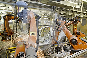 Welding robots in car production plant