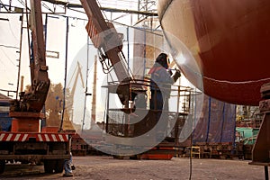 Welding on ship hull photo