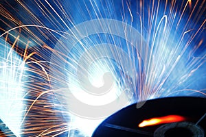 Welding with sparks in the factory.