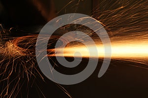 Welding with sparks in the factory.