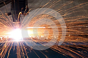 Welding with sparks in the factory.