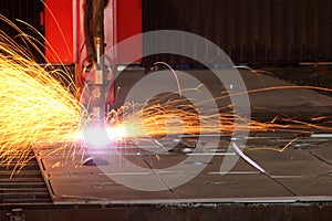 Welding with sparks in the factory.