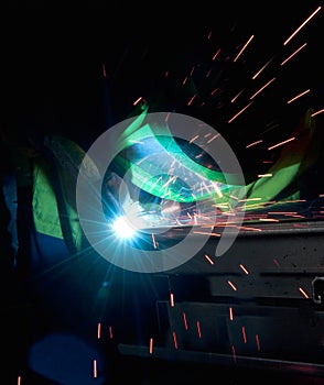 Welding steel rod and sparks