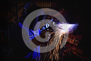 Welding steel structures and bright sparks in construction indus