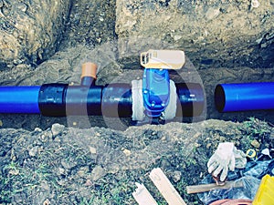 Welding of water supply plastic tubes excavation pit