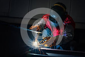 Welding by worker in factory, Thailand