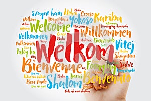 Welkom Welcome in Afrikaans word cloud with marker in different languages, conceptual background photo