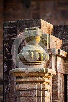 Well carved column with a Food Pot being offered to gods in Konark Sun Temple, Orissa, India. UNESCO Heritage