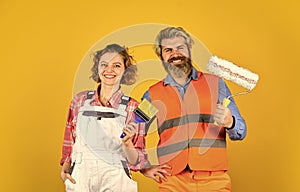 Well done. couple of architect wear hardhat. new house construction concept. Portrait of family wearing hardhat