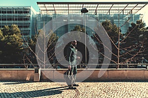 Well dressed man holding a weekender