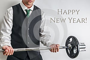 Well dressed man performing biceps curl. Concept for new years resolution and workout