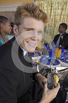 Well-dressed teenage boy at school dance