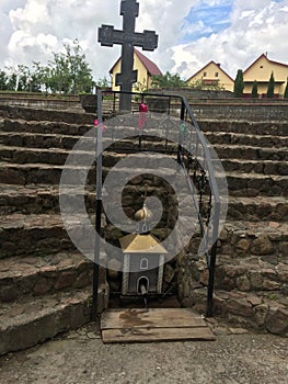 well-equipped spring with stairs next to the church in Synkovichi