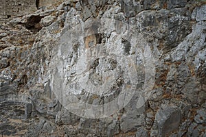 The well-known relief of a Rhodian trireme, warship, cut into the rock at the foot of the steps leading to the acropolis. Rhodes