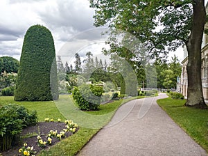 well maintained public park with paths and trimmed trees