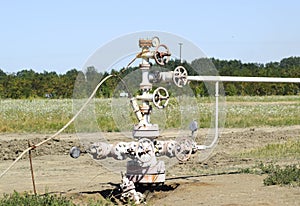 Well for oil and gas production. Oil well wellhead equipment. Oil production