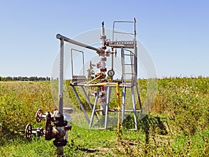 Well for oil and gas production. Oil well wellhead . Oil production